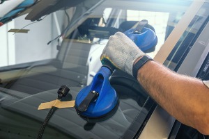 A member of Glass Specialty WLC tackles Auto Glass Repair in Warren County IL
